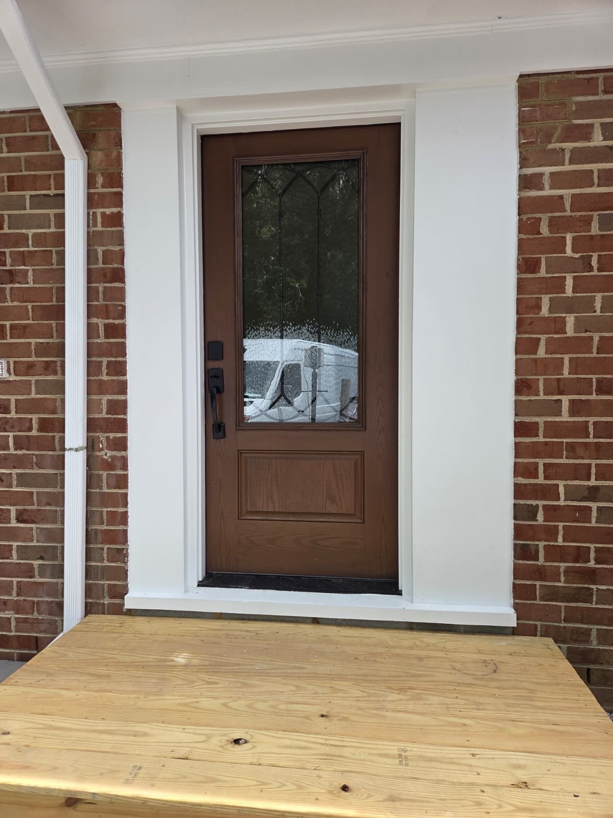 New fiberglass entry door installation with decorative glass by MAS Contractors in Richmond, VA