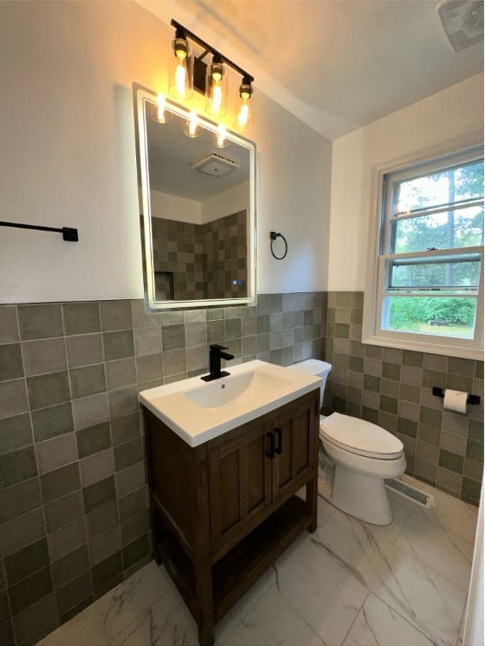 Bathroom tile remodel in Richmond, VA by MAS Contractors — walk-in shower with bench